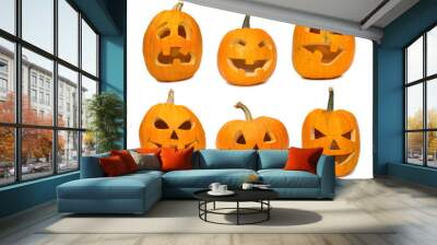 Carved Jack-o-lanterns lit for Halloween. Isolated on white Wall mural