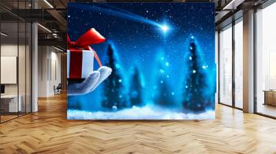 Christmas present from Santa Claus. Night starry sky with falling Christmas star Wall mural