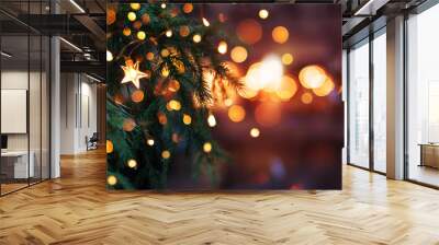 Christmas tree with garland lights. Evening city with blurred background and bright lights Wall mural