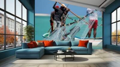 Net fishing in Rodrigues tropical island Wall mural