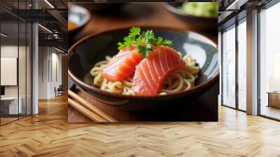 A bowl of noodles with two pieces of salmon on top Wall mural