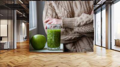 Adult woman having a good morning healthy breakfast smoothie drink made of super foods, fruits,  berries. Wall mural