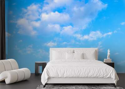 Blue sky background with white clouds in summer day. Wall mural