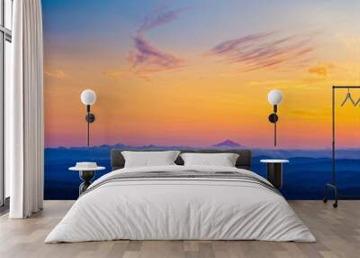 Tranquil Sunset Over a Beautiful Cloudscape Wall mural