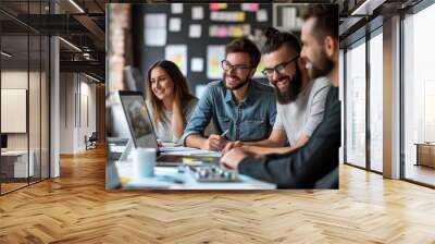 Happy creative marketing team working together in meeting room in office Wall mural