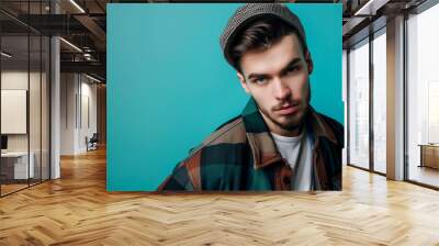 Portrait of young handsome fashionable man. Studio shot of trendy male model with copy space Wall mural