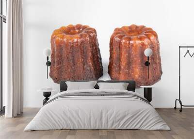 French sweet dessert caneles on white background Wall mural