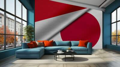 3D Rendering of two flags from Republic of Indonesia and japan together with fabric texture, bilateral relations, peace and conflict between countries, great for background Wall mural