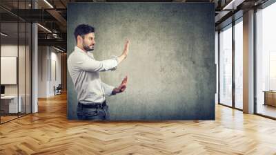 Bearded man making stop gesture Wall mural