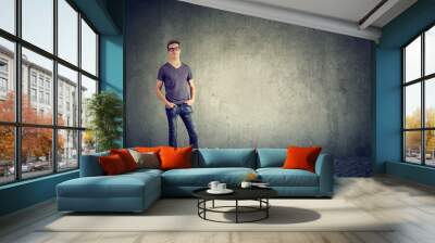 Casual handsome man in denim Wall mural