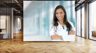 confident young female doctor medical professional in hospital Wall mural