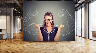 happy woman exults pumping fists celebrates success Wall mural