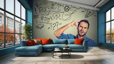 houghtful man thinking dreaming has many ideas looking up Wall mural