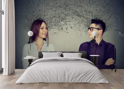 man and woman looking at each other exchanging with many thoughts Wall mural