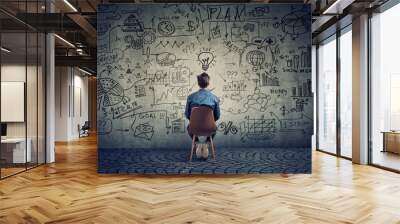 Man brainstorming on business plan Wall mural