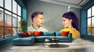 Man talking to an attractive woman with question mark Wall mural