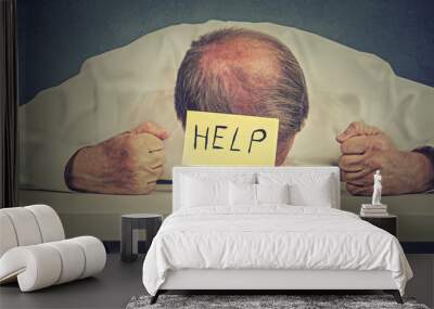 Tired, stressed senior employee needs help Wall mural