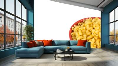 bowl of dried pasta or elbow pasta over white background Wall mural