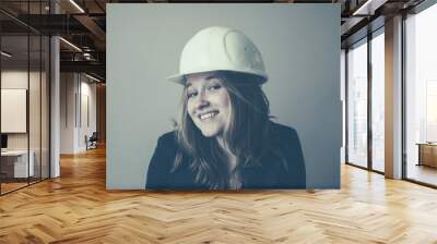 Young woman with hard hat Wall mural