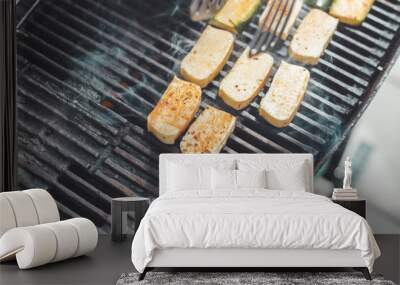 bbq on weekend. grill cheese and vegetables on gas grill. outdoors. Wall mural