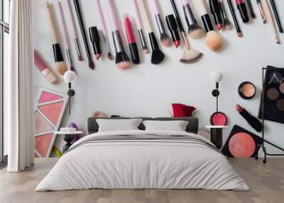 Make up concept: Professional makeup tools and accessories. Lipstick, mascara, nail polish, eyeshadow, powder, eyelash and foundation. Top view. Wall mural