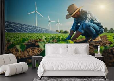 Farmer tending crops in field with solar panels and wind turbines, sustainable agriculture and renewable energy concept, modern farming practices in scenic rural landscape Wall mural