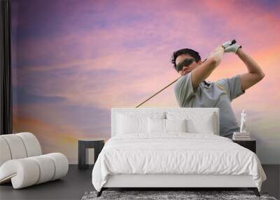 Golfer shooting a golf ball Wall mural