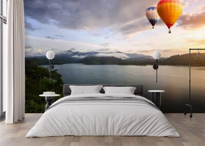 Hot air balloons floating over lake Wall mural