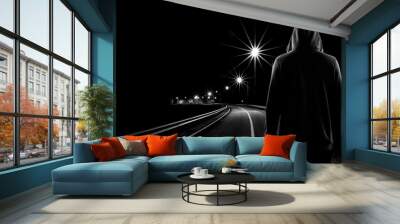 teenager boy standing alone in the street at night Wall mural