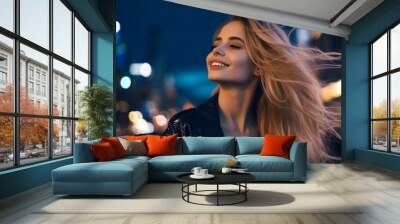 Portrait of young european fashionable female model, shot from the side, smiling, looking to the side, vibrant cityscape at night background Wall mural