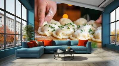 Traditional pierogi with mashed potato and cheese fillings, freshly prepared for a Central European Thanksgiving celebration, garnished with chives Wall mural