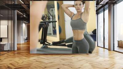 Beautiful Fit Women exercise in the gym. Wall mural