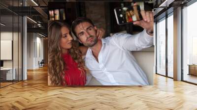 Couple Taking Selfie in Cafe Wall mural