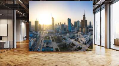 Panorama of Warsaw city center with modern architecture at sunset. Wall mural