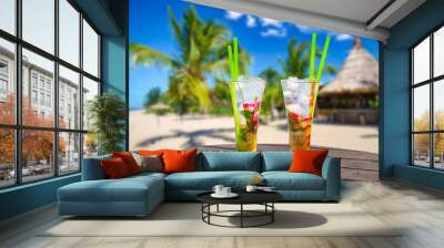 Two tropical cocktails at the exotic beach Wall mural