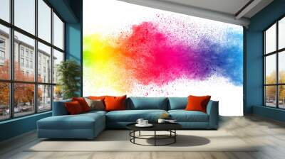 Abstract multi color powder explosion on white background.  Freeze motion of  dust  particles splashing. Painted Holi in festival. Wall mural