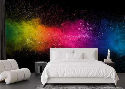 Colorful background of pastel powder explosion.Multi colored dust splash on black background.Painted Holi. Wall mural