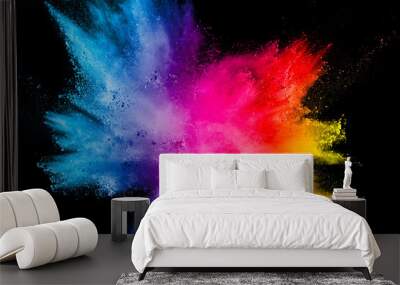 Multi color powder explosion isolated on black background. Wall mural