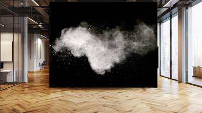 White powder explosion cloud against black background.White dust particle splash. Wall mural