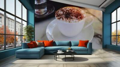 Hot cappuccino coffee in a white cup Wall mural