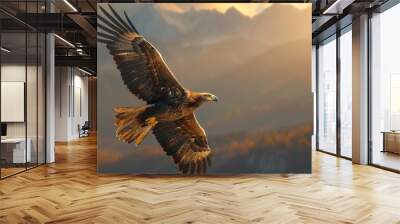 A powerful eagle soaring over a rugged mountain range at dawn, with the rising sun casting golden hues Wall mural