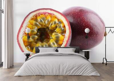 A whole passion fruit with a halved section showing the inside on a white background Wall mural