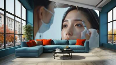 Asian girl at a beauty clinic receiving cosmetic surgery for skin whitening and rejuvenation, achieving a youthful appearance Wall mural