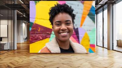 Close-up of a LGBTQ person with a background of rainbow stripes, celebrating pride and identity Wall mural