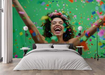 Cheerful young woman with a wide smile, throwing festive confetti on green background.
Gleeful lady with a big smile celebrating with confetti flying around her isolated on a green screen bg. Wall mural