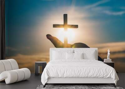 christian worship hand on light cross background Wall mural