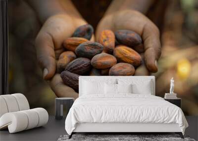 hand holding a handful of cocoa beans, Cocoa cultivation concept Wall mural