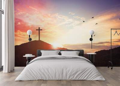 Christmas concept: Crucifixion Of Jesus Christ Cross At Sunset Wall mural