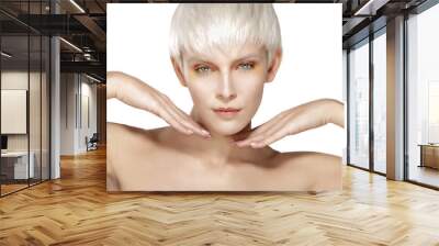 Beauty model blonde short hair showing perfect skin Wall mural