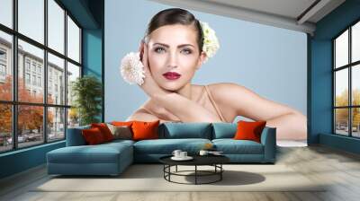 beauty shot of smiling woman with   flowers accessories Wall mural